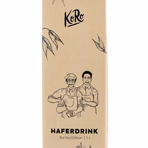 Beigefarbene Getränkekartonverpackung mit dem Markennamen KoRo und der Aufschrift 'Haferdrink Barista Edition 1 l'. Auf der Vorderseite befindet sich eine schwarz-weiße Linienzeichnung von zwei Personen in Barista-Kleidung, die gemeinsam ein Getränk zubereiten. Um die Zeichnung sind stilisierte Haferähren abgebildet. Der Schraubverschluss ist oben mittig angebracht.
