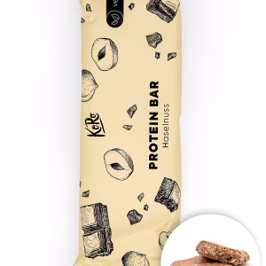 Eine Packung Protein Bar vegan steht aufrecht vor weißem Hintergrund